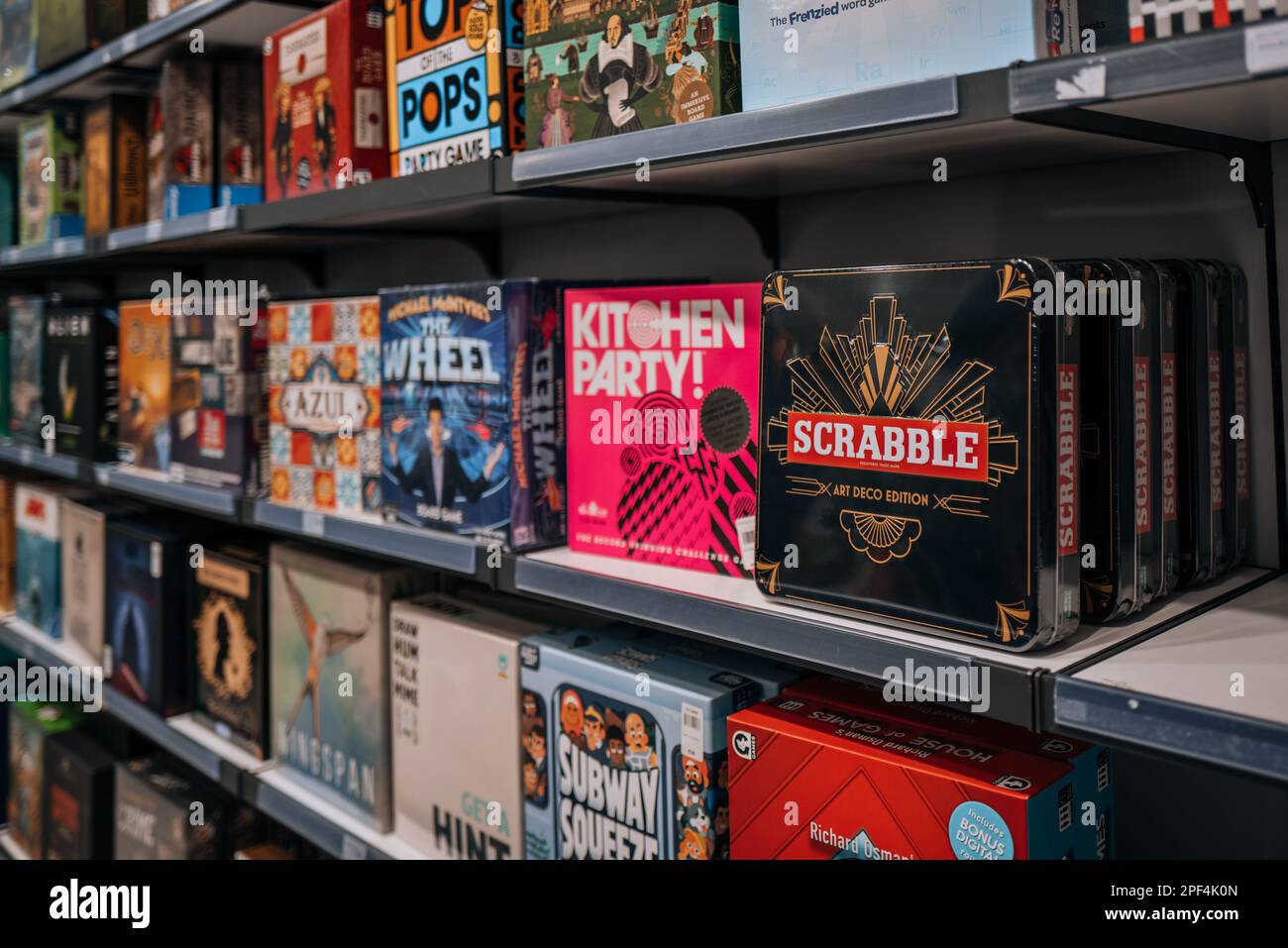 London, UK - February 21, 2022: Modern and classing board games on sale at a department store. Sales of board games skyrocketed since the Coronavirus Stock Photo