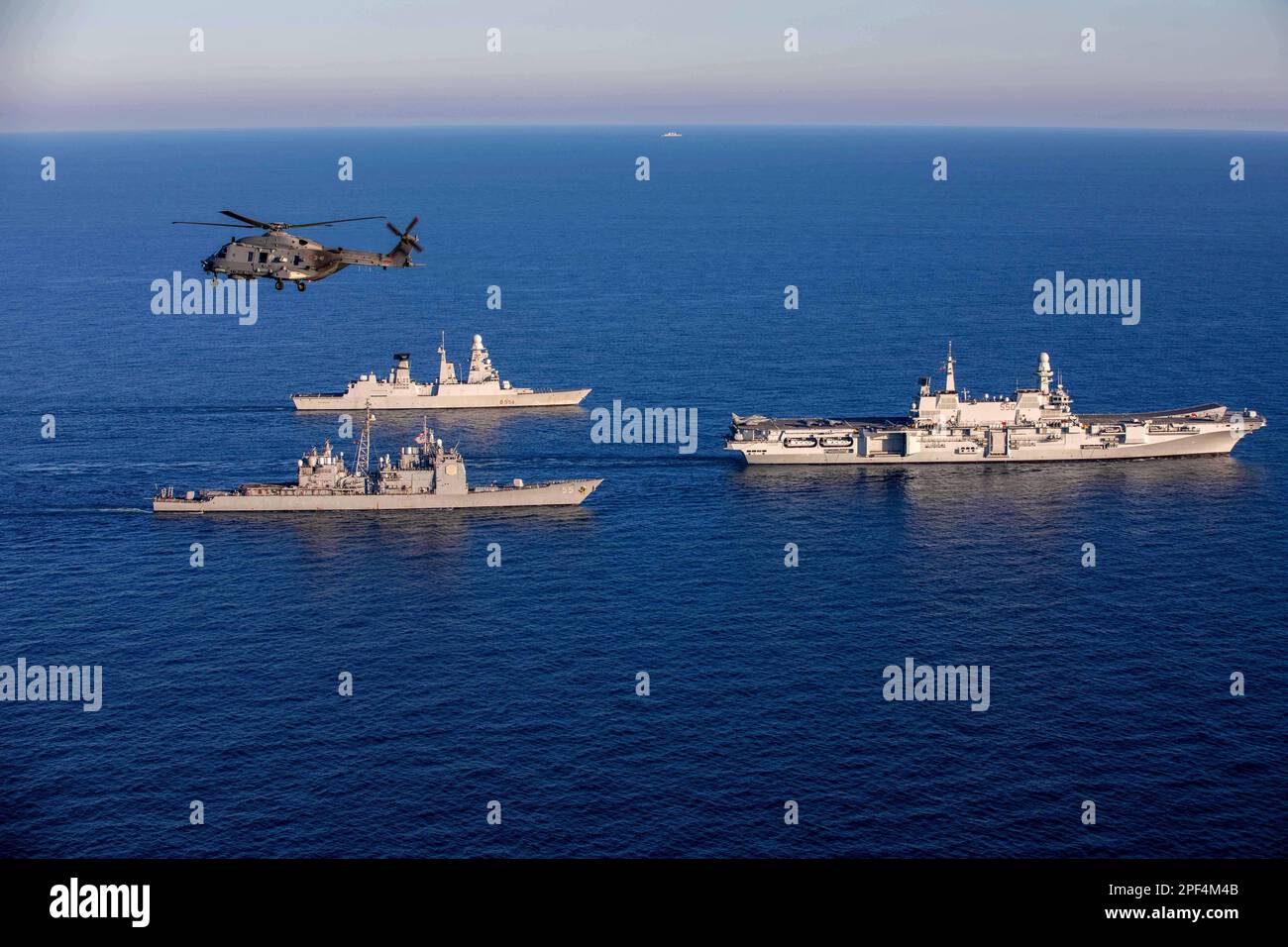 Ionian Sea. 21st Feb, 2023. 230221-N-TC847-1202 IONIAN SEA (February. 21, 2023) The Ticonderoga-class guided-missile cruiser USS Leyte Gulf (CG 55), bottom left, sails in formation with the Italian aircraft carrier ITS Cavour (C 550) and Orizzonte-class destroyer ITS Caio Duilio (D 554), right, February. 21, 2023. The George H.W. Bush Carrier Strike Group is on a scheduled deployment in the U.S. Naval Forces Europe area of operations, employed by U.S. Sixth Fleet to defend U.S., allied, and partner interests. Credit: U.S. Navy/ZUMA Press Wire Service/ZUMAPRESS.com/Alamy Live News Stock Photo