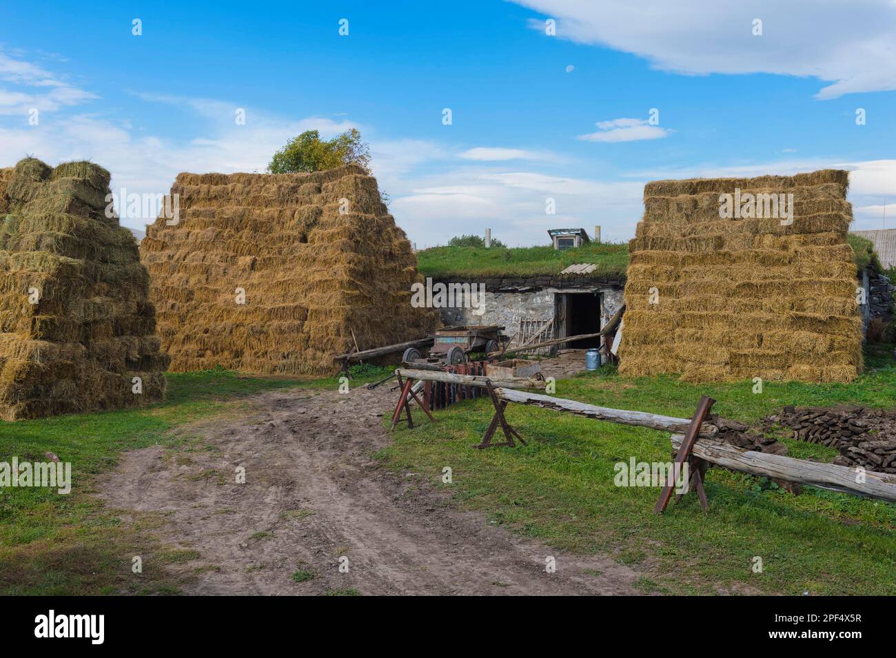 George Rurual Scene Haystack, peat and rural house, Bokdajeni village, Georgia Stock Photo ...