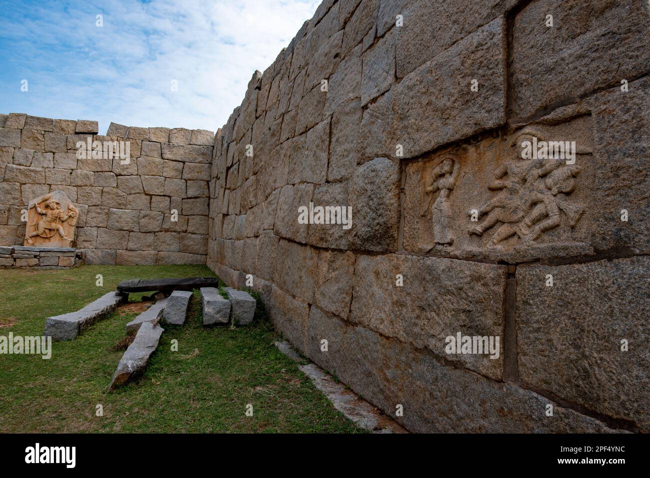 Massive stone walls which form the fortification of Hampi which was the ...