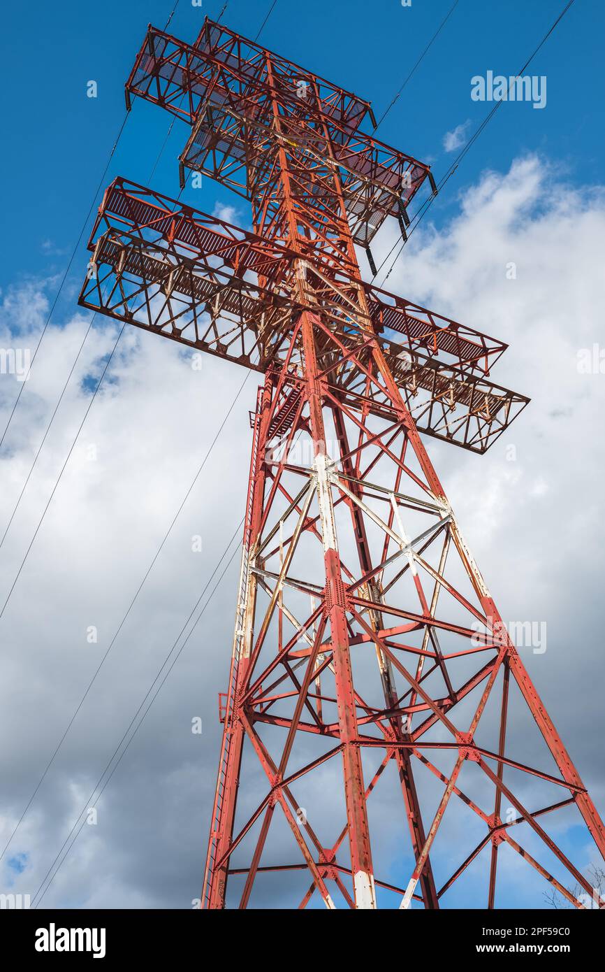 High voltage towers with sky background. Electrical power lines and tower. High voltage post or High voltage tower. Green energy concept, Electricity Stock Photo