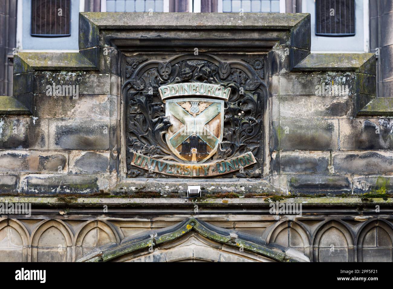 The crest of the Edinburgh University Union above the main entrance of Teviot Row House, one of the main buildings of EUSA in Bristo Square. Stock Photo