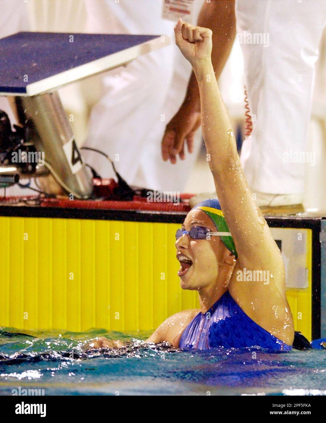 Brazil's Flavia Delaroli reacts after winning the silver medal in the 50 meters freestyle at the Pan American Games on Saturday, Aug. 16, 2003 in Santo Domingo, Dominican Republic. (AP Photo/Joe Cavaretta) Stock Photo
