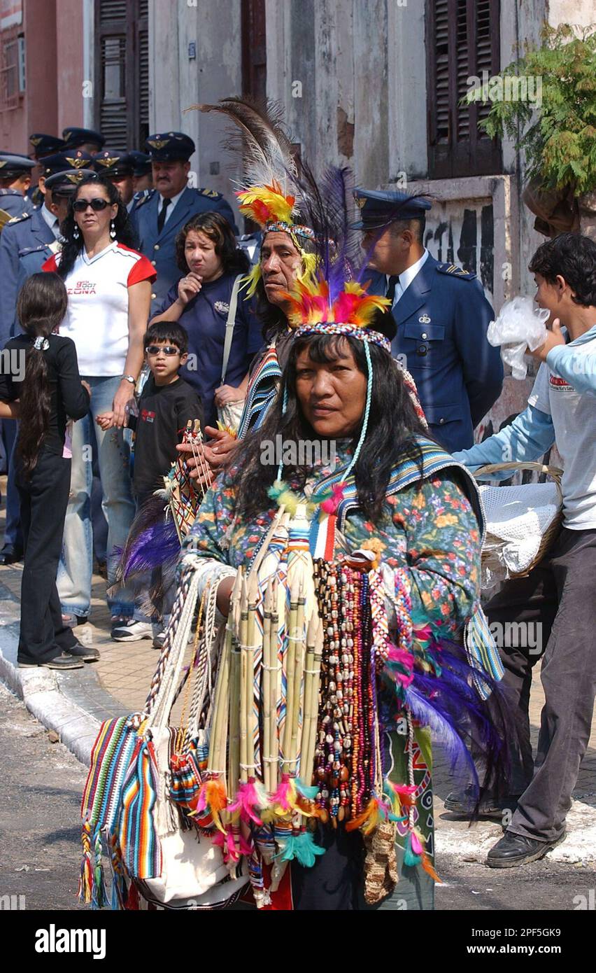Juanita, center, and Amarilla, indigenous Indians of the Maca ethnic