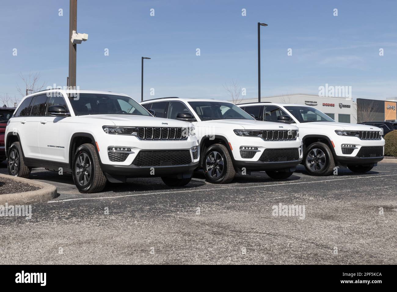 Indianapolis - Circa March 2023: Jeep Grand Cherokee display at a dealership. Jeep offers the Grand Cherokee in Laredo, Limited, and Trailhawk models. Stock Photo