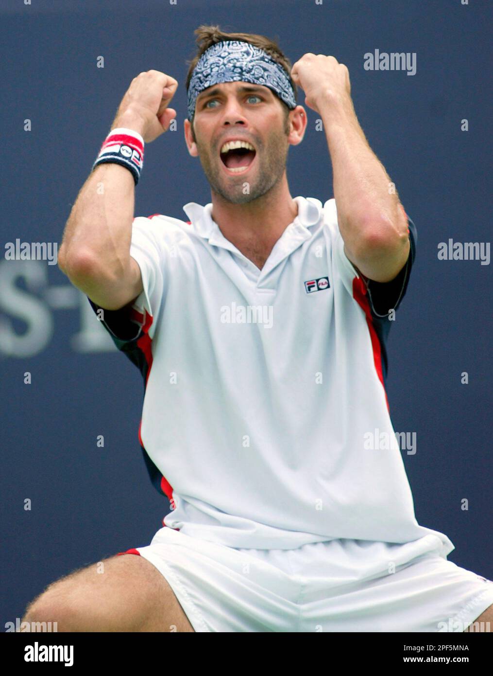 Simon Larose from Canada, celebrates his 7-6 (5), 1-6, 7-5 victory over  Jose Acasuso of Argentina at the Tennis Masters Canada Series Wednesday,  August 6, 2003 in Montreal. (AP PHOTO/Paul Chiasson Stock Photo - Alamy
