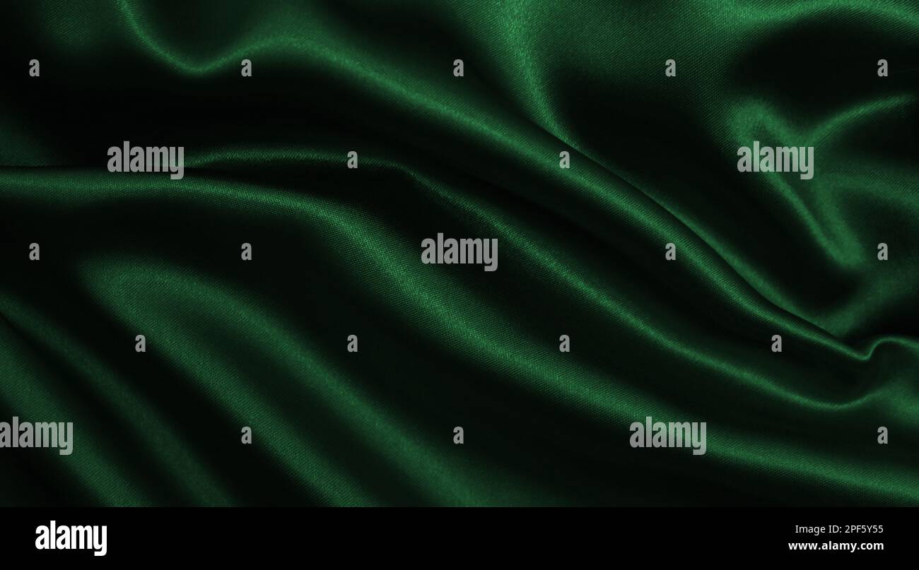 Smooth elegant green silk or satin luxury cloth texture can use as ...