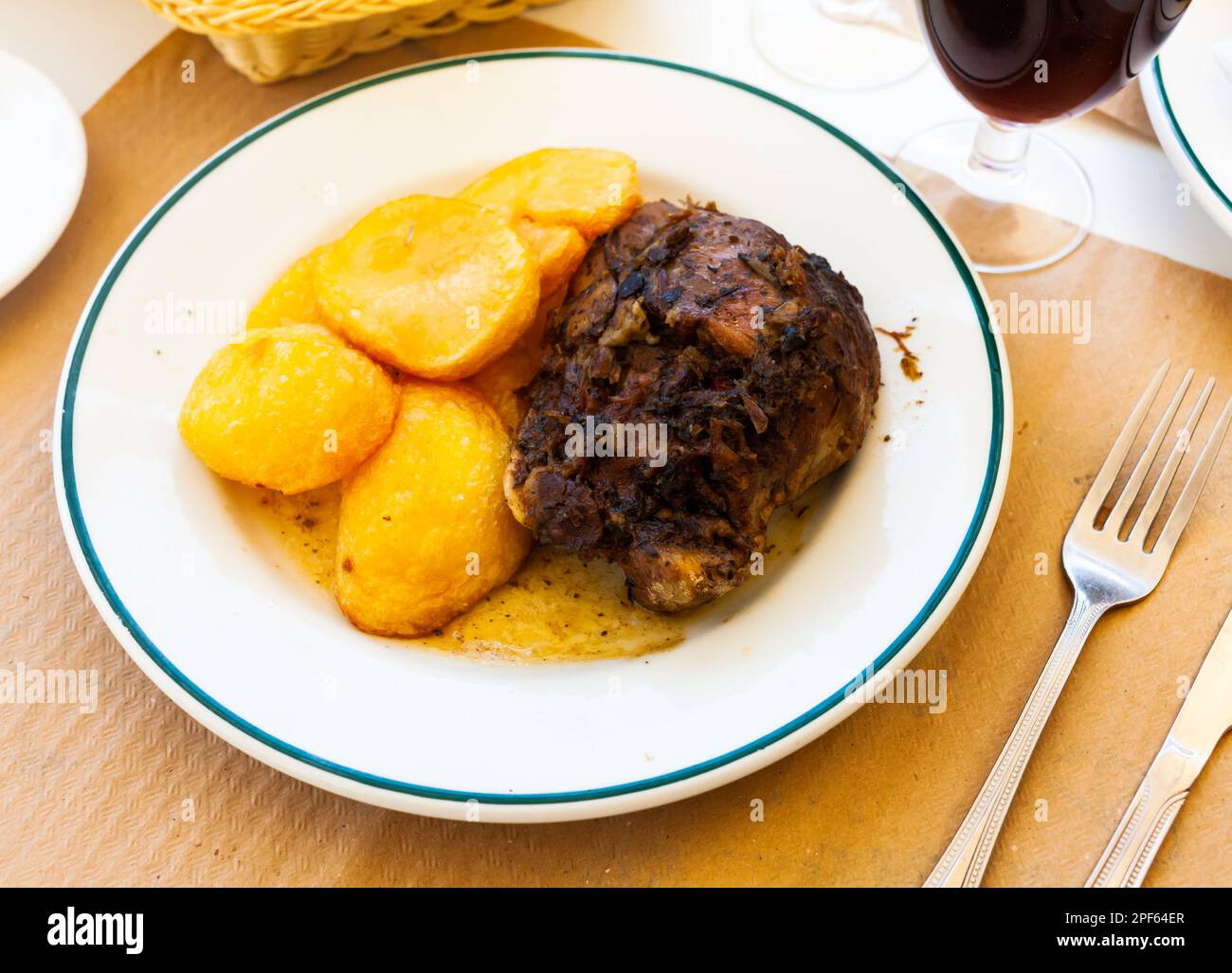 Baked pork pieces with potatoes in goulash Stock Photo Alamy