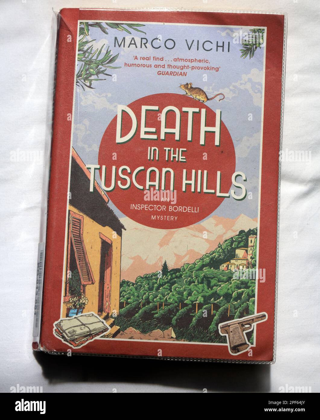 Death in The Tuscan ills by Marco Vichi. Paperback novel cover. Worn. Stock Photo