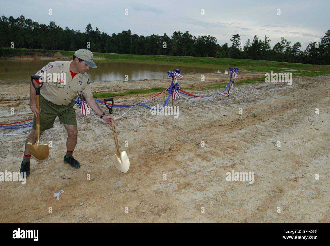 Brian Steger a Boy Scout troop leader begins placing the ceremonial
