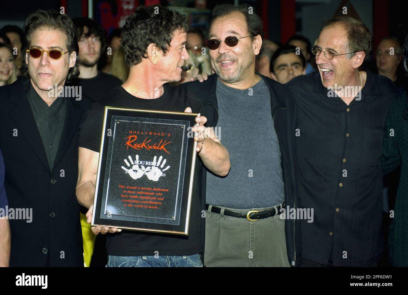 Musical icon Lou Reed, second from left, stands with comedian Richard  Lewis, left; actor/musician Ruben Blades, second from right; and producer  Bob Ezrin Tuesday, June 24, 2003, in the Hollywood section of