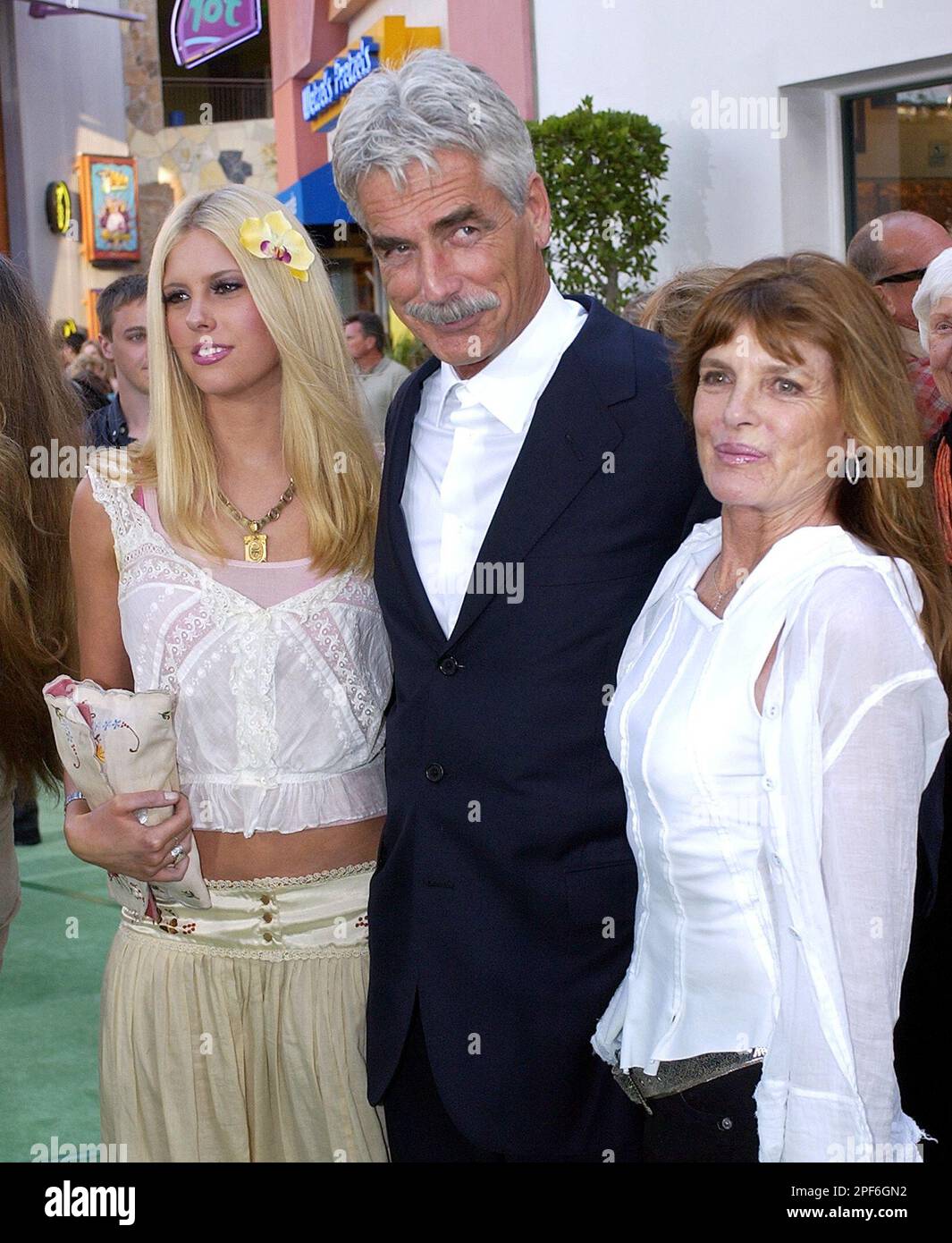 Actor Sam Elliott, daughter Cleo, left, and wife Katharine Ross arrive