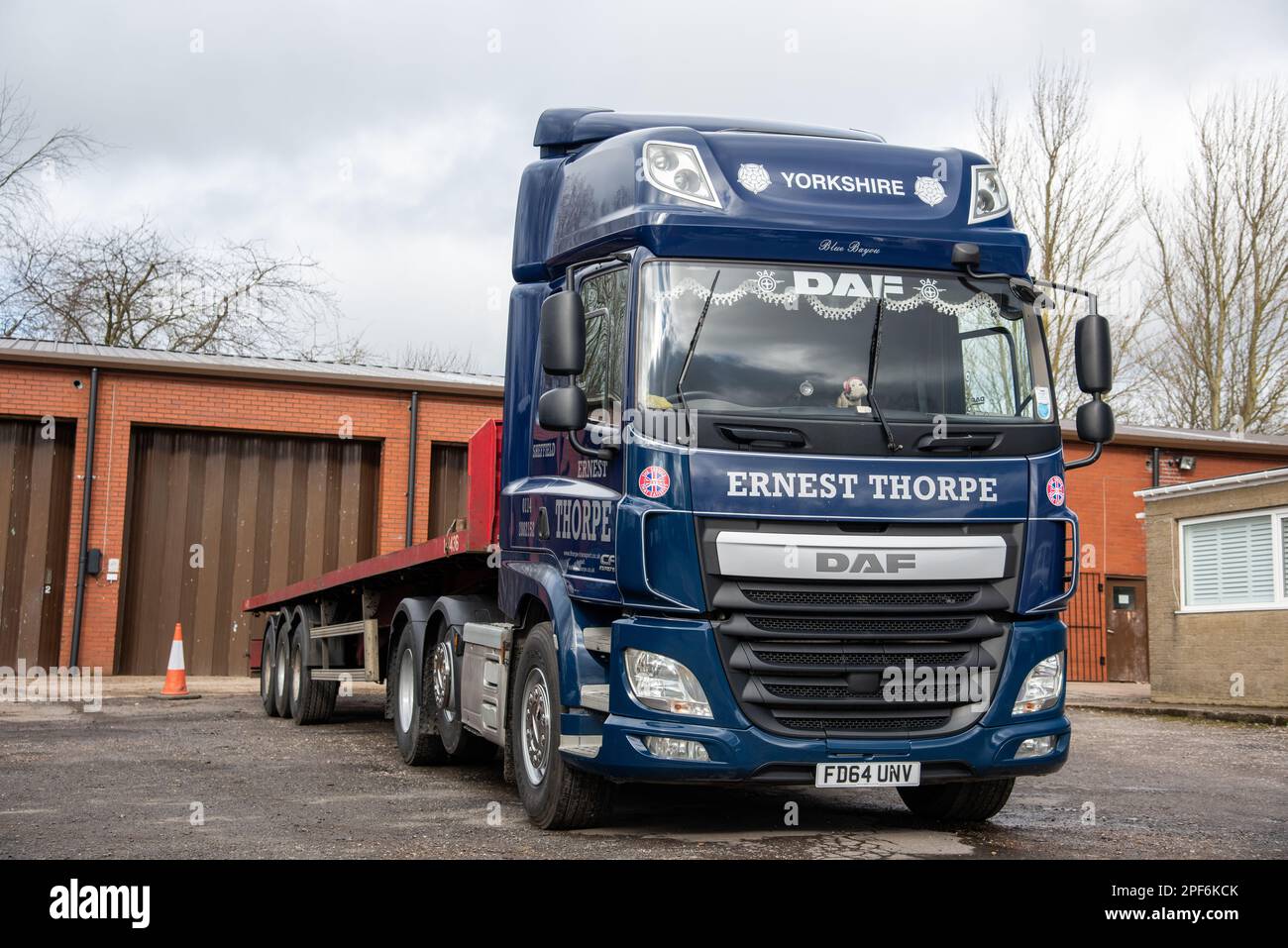 DAF CF truck of Ernest Thorpe Haulage parked in a freight yard in Winter Stock Photo