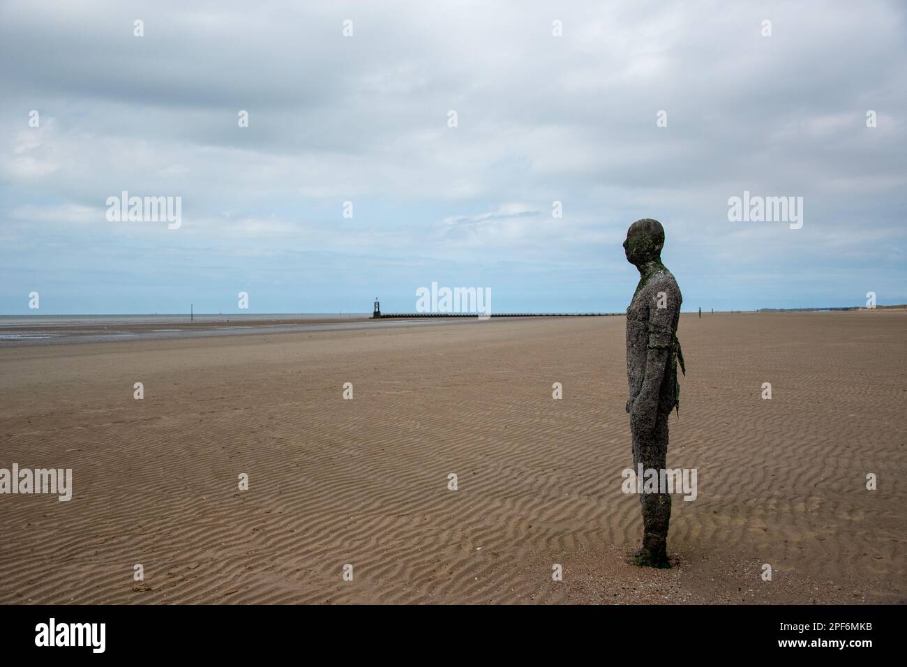Figure from artist Antony Gormley's installation Another Place' on