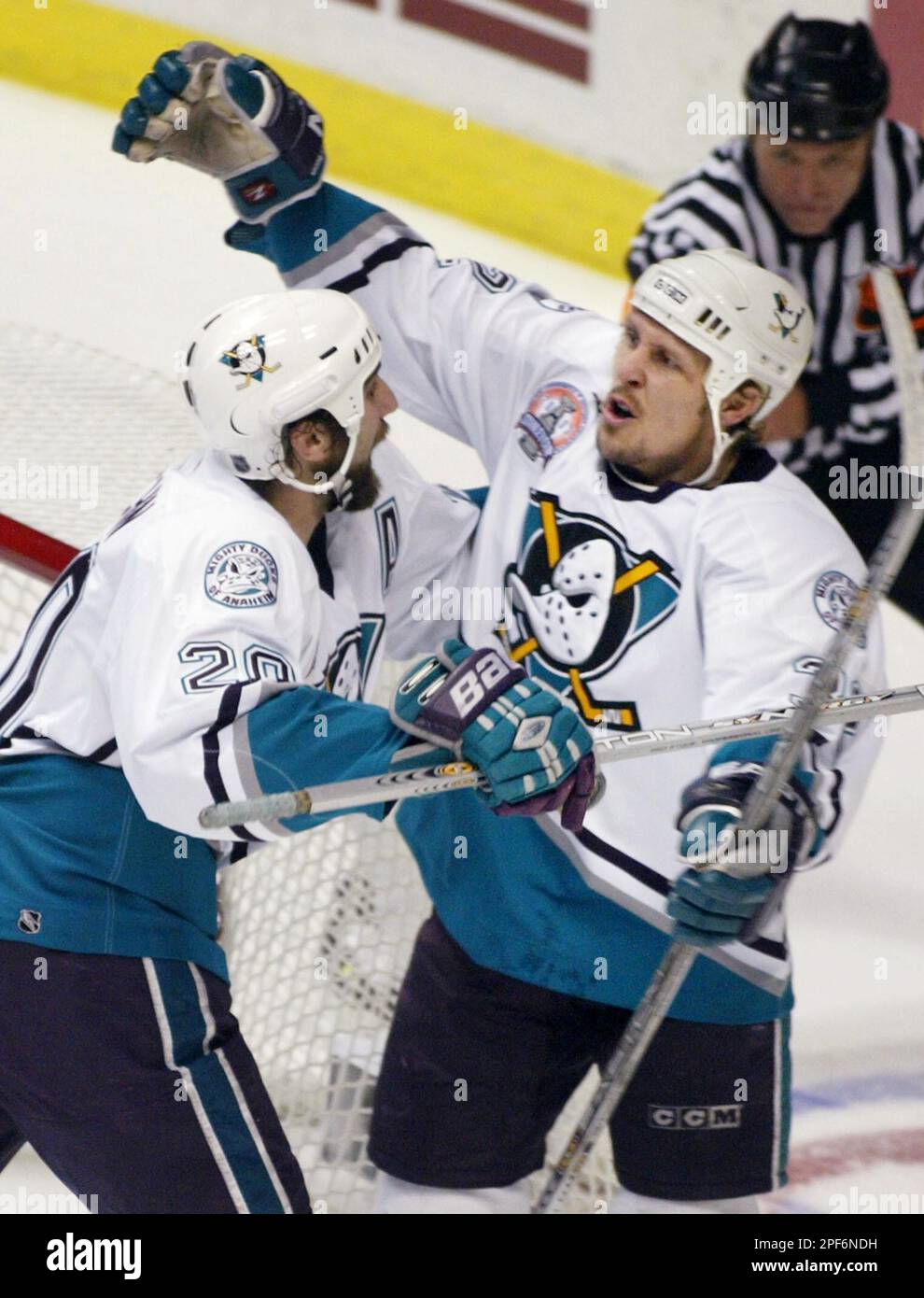 Anaheim Mighty Ducks Steve Thomas, right, celebrates his goal against the New  Jersey Devils with teammate Steve Rucchin during first period Game 6 Stanley  Cup Finals action Saturday, June 7, 2003 in