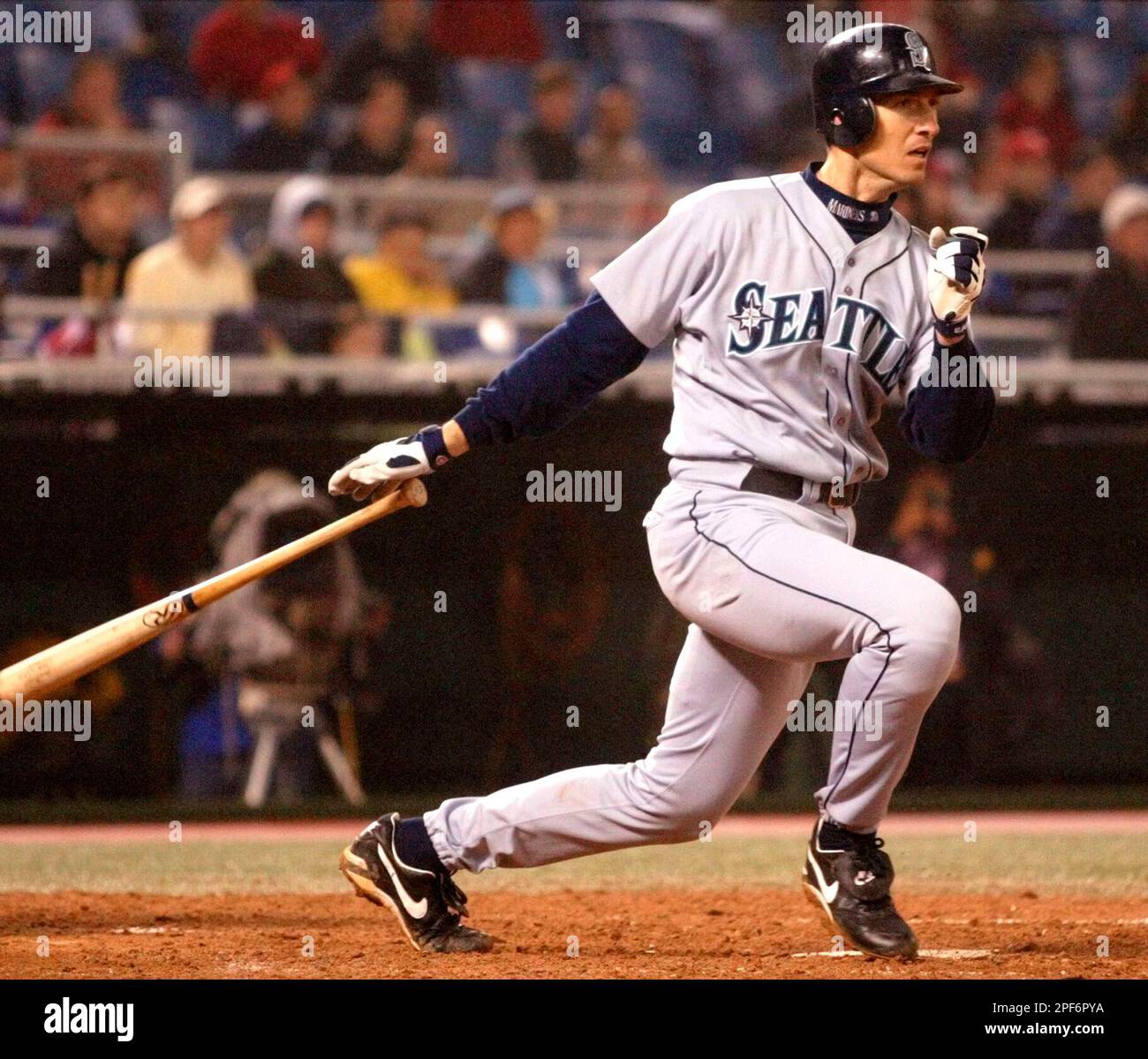 Seattle Mariners' John Olerud watches his RBI double against Philadelphia  Phillies reliever Terry Adams in the seventh inning of their interleague  game Wednesday, June 4, 2003, in Philadelphia. (AP Photo/Rusty Kennedy Stock