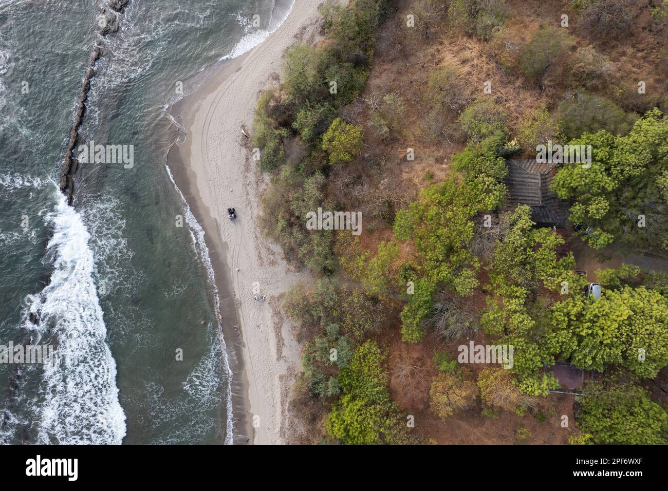 Seafront beach in ocean aerial above top drone view Stock Photo