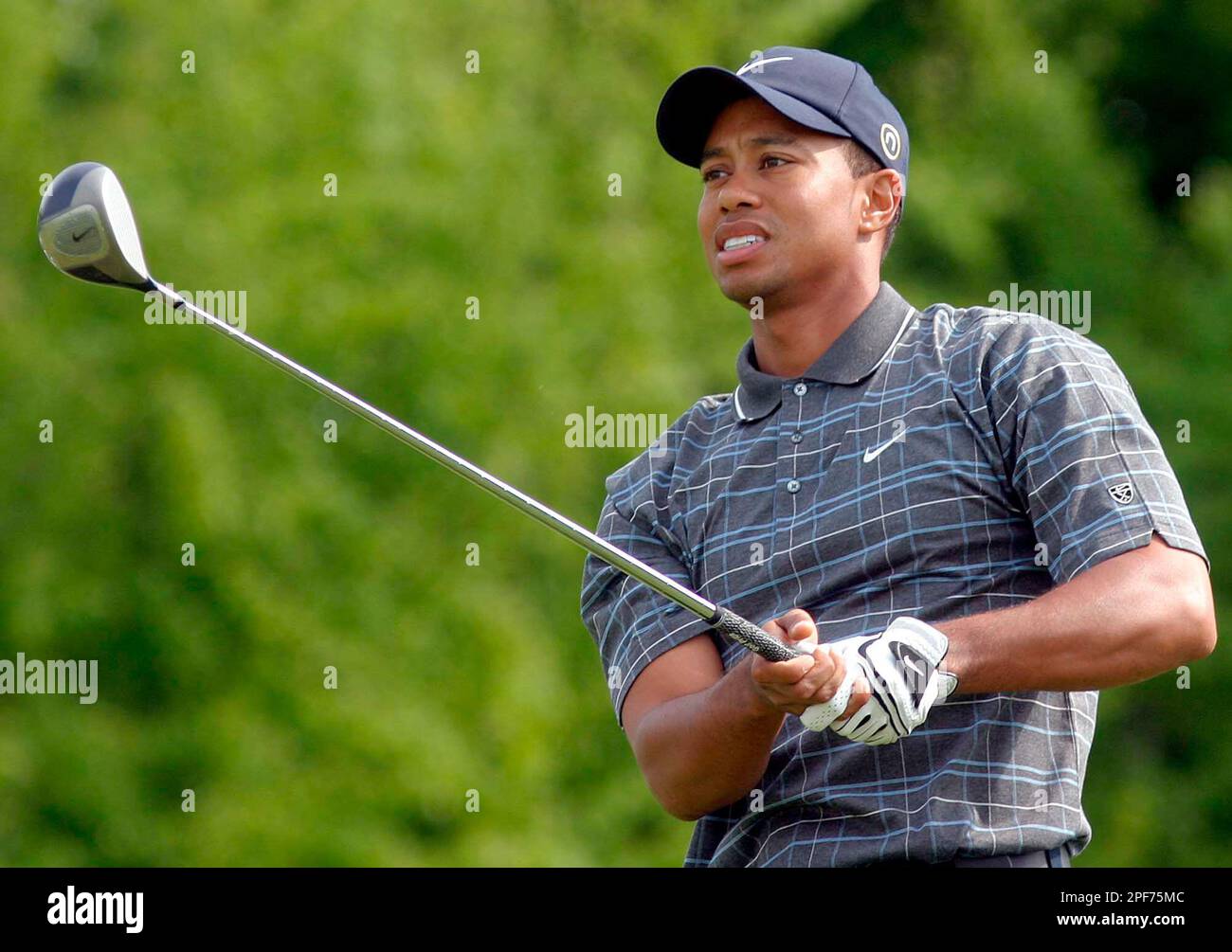U.S. golfer Tiger Woods is seen during the third day of the Deutsche  Bank-SAP Open golf tournament in Gut Kaden near Hamburg, northern Germany,  Saturday May 17, 2003. (AP Photo/Fabian Bimmer Stock