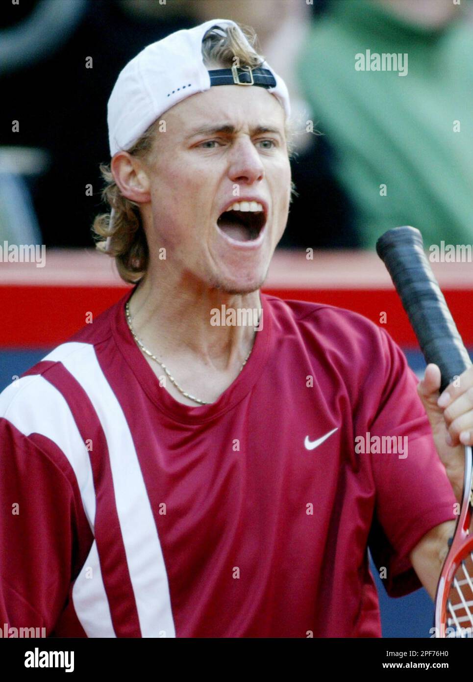 A dejected Lleyton Hewitt from Australia shouts in frustration during his match against Fernando Gonzales from Chile during current Tennis Masters Hamburg 2003 in Hamburg, northern Germany, on Thursday, May 15, 2003.