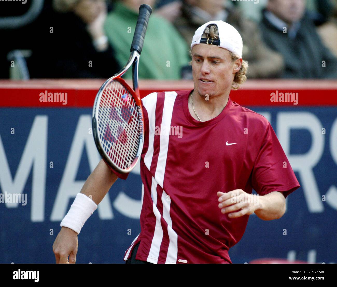 A dejected Lleyton Hewitt from Australia hurls his racket during his match  vs Fernando Gonzales from Chile during current Tennis Masters Hamburg 2003  in Hamburg, northern Germany, on Thursday, May 15, 2003.