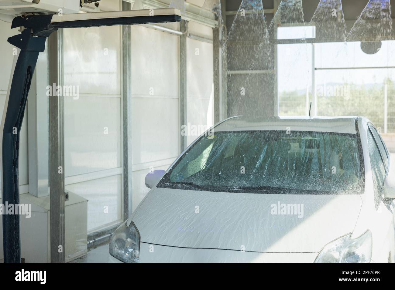Car washing in automobile laundry Stock Photo Alamy