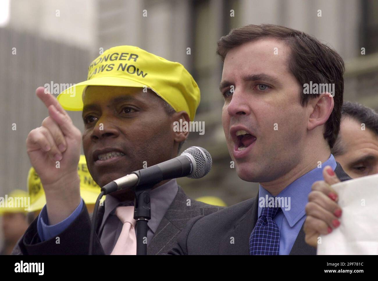 New York City Council Speaker Gifford Miller, right, speaks at a rally