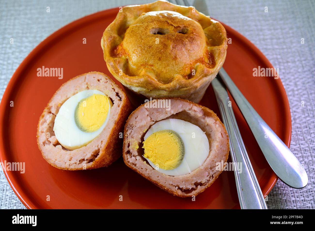 Traditional street food in UK, stuffed fried Scotch eggs with