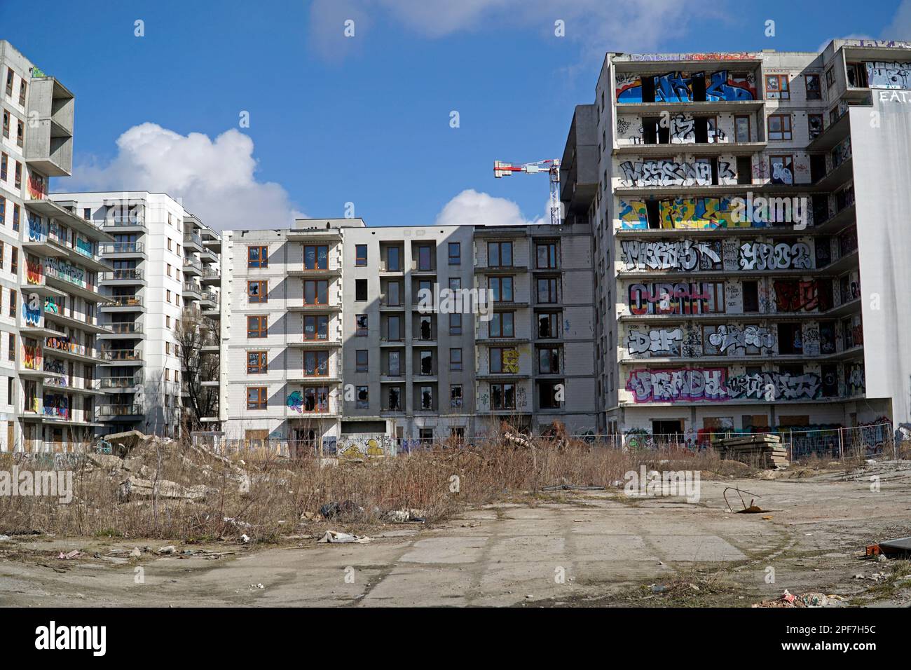 Warsaw, Poland, March 16th 2023 Unfinished residential building covered with graffiti