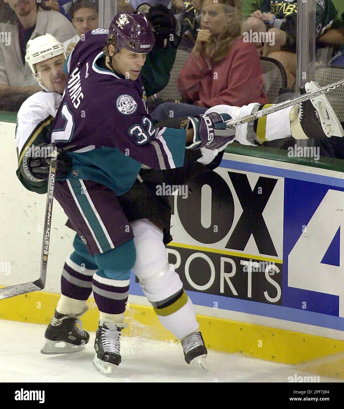 Anaheim Mighty Ducks' Steve Thomas watches the New Jersey Devils celebrate their 3-0 victory in Game 7 Stanley Cup Finals Monday, June 9, 2003 in East Rutherford, NJ. (AP Photo/Paul Chiasson Stock Photo - Alamy