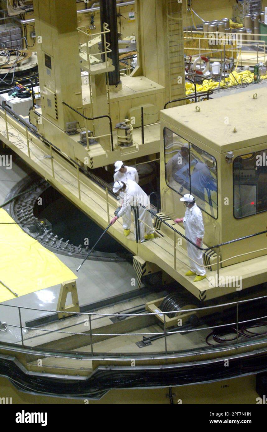Employees work at reactor 2 of the Paks Nuclear Power Plant in Paks ...