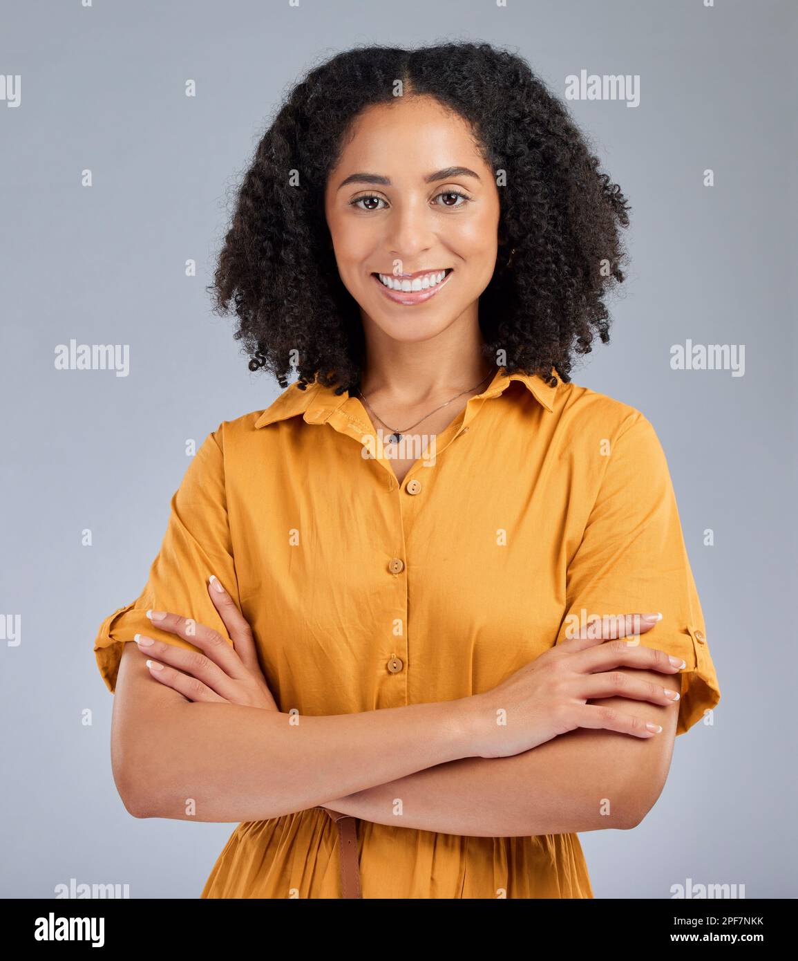 Happy, pride and portrait of a woman with arms crossed isolated on a ...