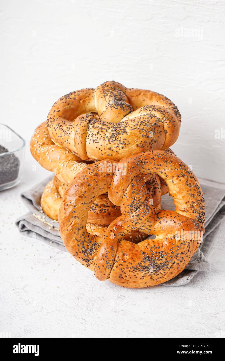 Stack of tasty pretzels on light background Stock Photo Alamy