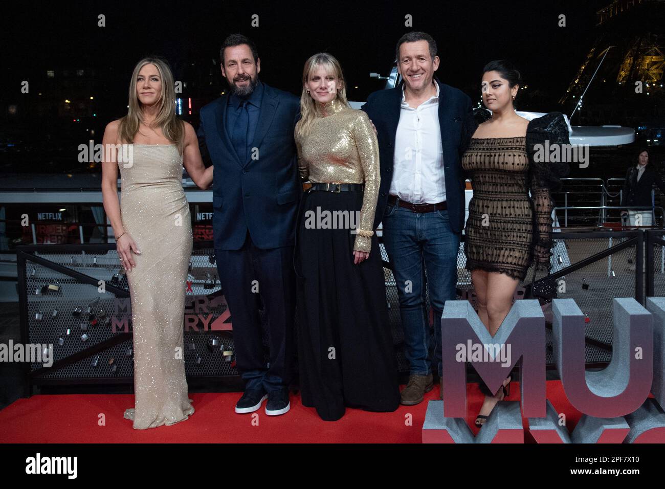 Los Angeles, USA. 28th Mar, 2023. MURDER MYSTERY 2 Cast & Crew - (Standing,  L-R) Jason Young, Ori Marmur, Zurin Villanueva, Ted Sarandos, Jodie  Turner-Smith, Adam Sandler, Scott Stuber, Jennifer Aniston, Jeremy