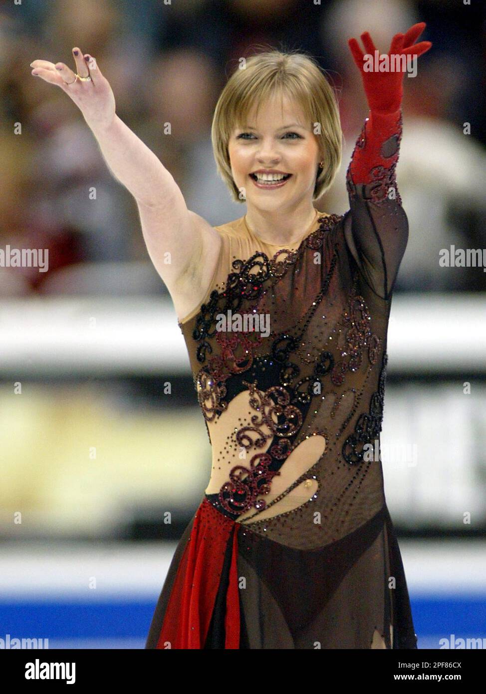 Elena Sokolova of Russia salutes the crowd following her free program ...