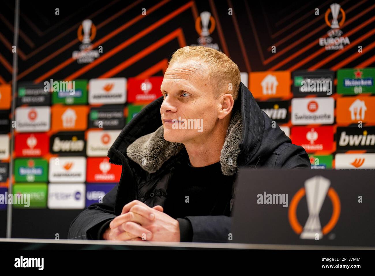 BRUSSELS, BELGIUM - MARCH 16: Coach Karel Geraerts of Royale Union  Saint-Gilloise attends a press conference after the UEFA Europa League  Round of 16 Leg Two match between Royale Union Saint-Gilloise and