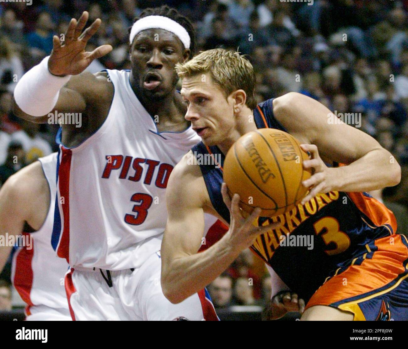 Golden State Warriors Bob Sura left looks to pass around