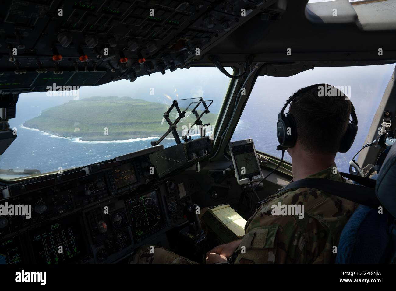 Northern Mariana Islands. 3rd Mar, 2023. A U.S. Air Force pilot assigned to the 3rd Air Expeditionary Wing flys C-17 Globemaster III assigned to the 15th Wing, Joint Base Pearl-Hickam, Hawaii, over the Northern Mariana Islands during Exercise Agile Reaper 23-1, March 4, 2023. AR 23-1 supports the Air Force's requirement for expeditionary skills necessary to operate outside of military installations; Airmen must have diverse skills that enable them to operate in a contested, degraded, and operationally limited environment. (photo by Airman 1st Class Julia Lebens) (Credit Image: © U.S. Air F Stock Photo