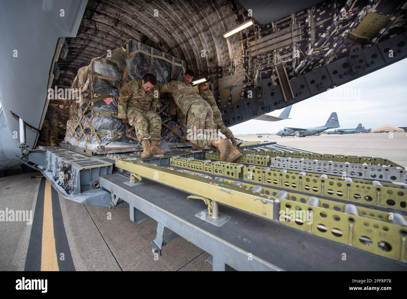 Lousville, Kentucky, USA. 10th Feb, 2023. Members of the 123rd Logistics Readiness Squadron load a pallet of cargo onto a North Carolina Air National Guard C-17 Globemaster III at Kentucky Air National Guard Base in Louisville, Ky., Feb. 10, 2023. The gear was transported to the Northern Mariana Islands for Cope North, a multinational exercise designed to enhance combat readiness in the South Pacific. (U.S. Air National Guard photo by Phil Speck) Credit: U.S. Air Force/ZUMA Press Wire Service/ZUMAPRESS.com/Alamy Live News Stock Photo