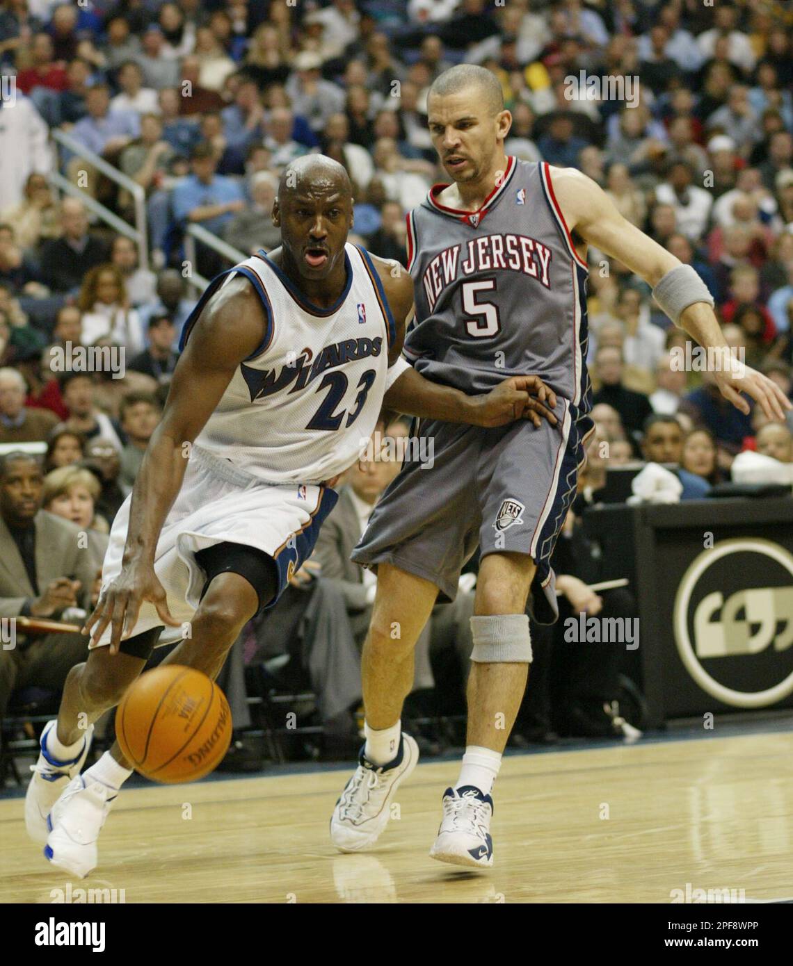 Washington Wizards' Michael Jordan, left, drives past New