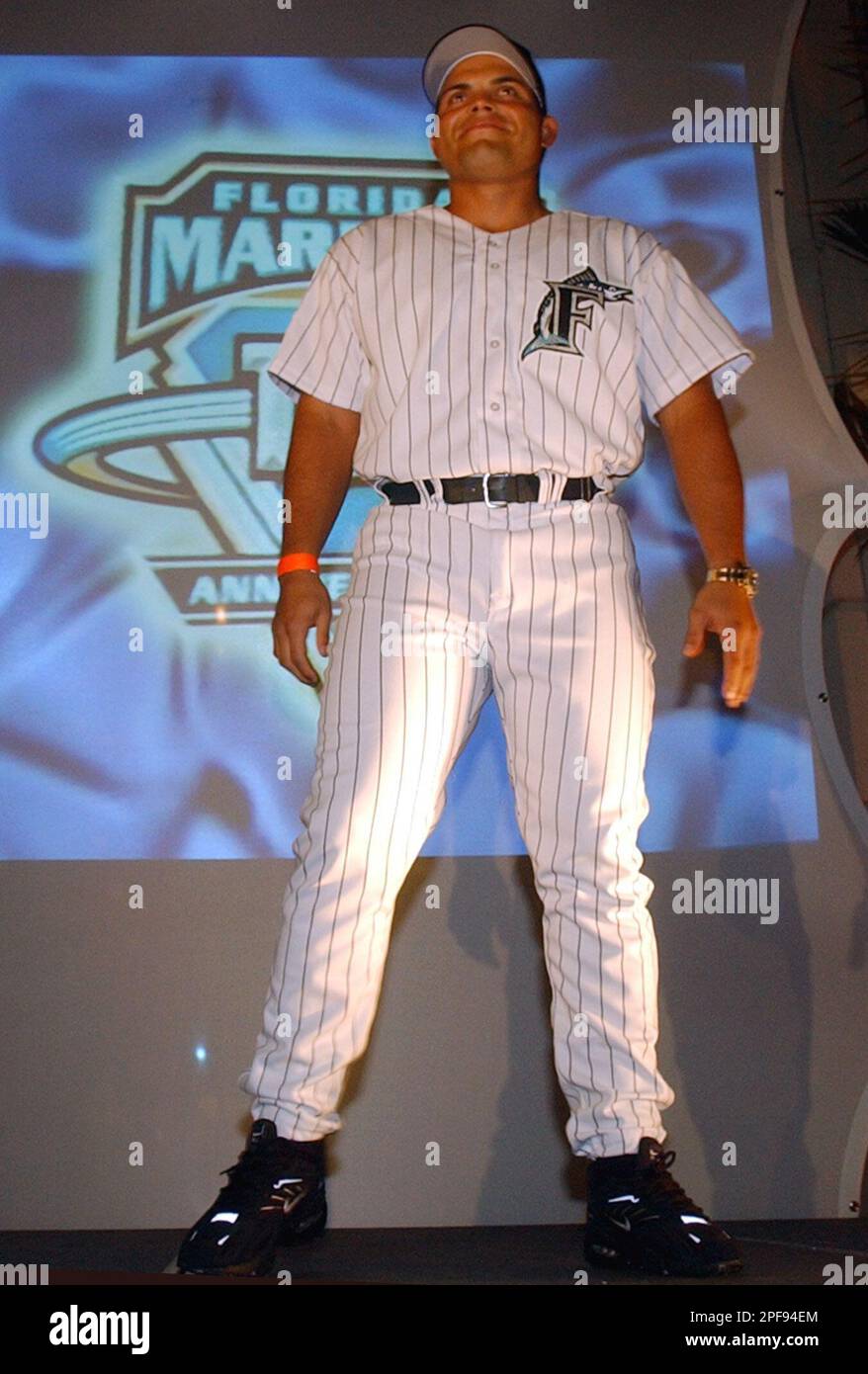 Florida Marlins catcher Ivan Rodriguez shows off the team's new alternate  home uniform for the 2003 season, Friday, Feb. 7, 2003, in Coral Gables,  Fla. (AP Photo/Alan Diaz Stock Photo - Alamy