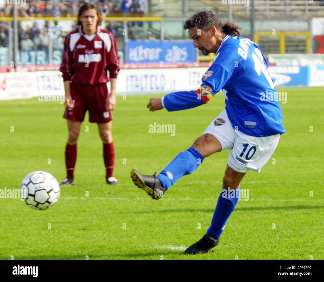 Brescia's striker Roberto Baggio scores on a penalty kick the