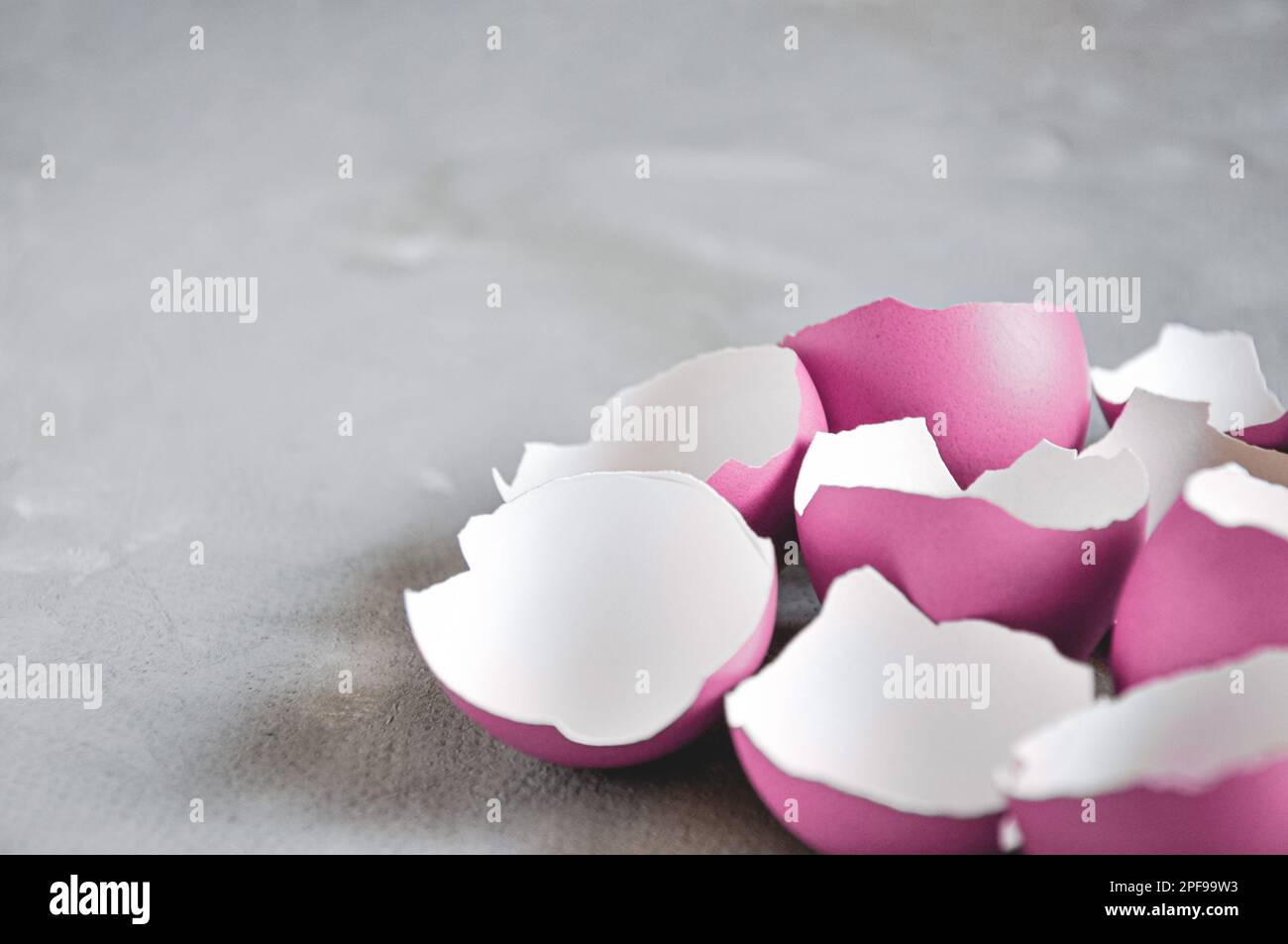 Broken Easter egg. Colored eggs. Cracked shell. Happy Easter springtime background Stock Photo