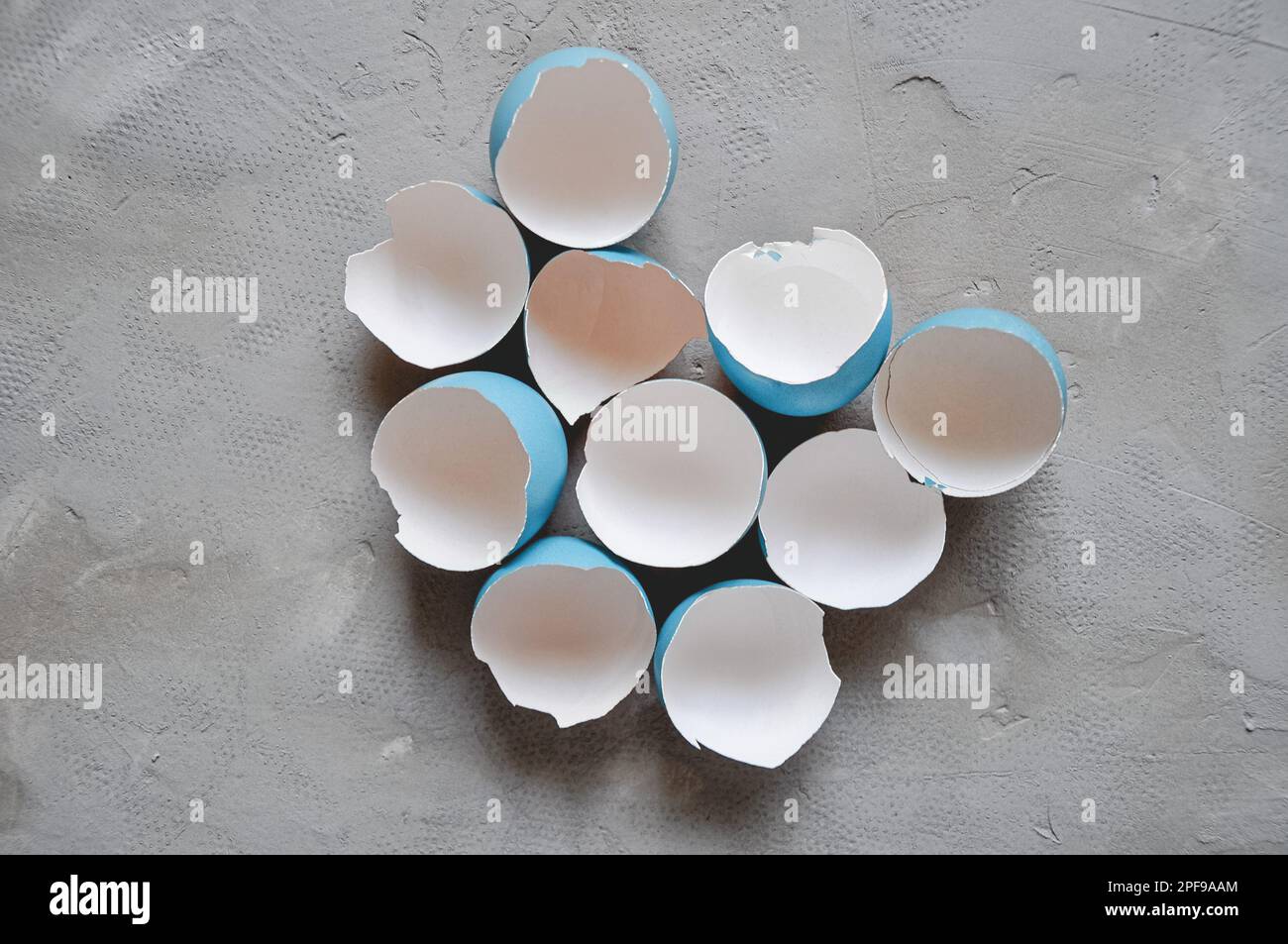Broken Easter egg. Colored eggs. Cracked shell. Happy Easter springtime background Stock Photo