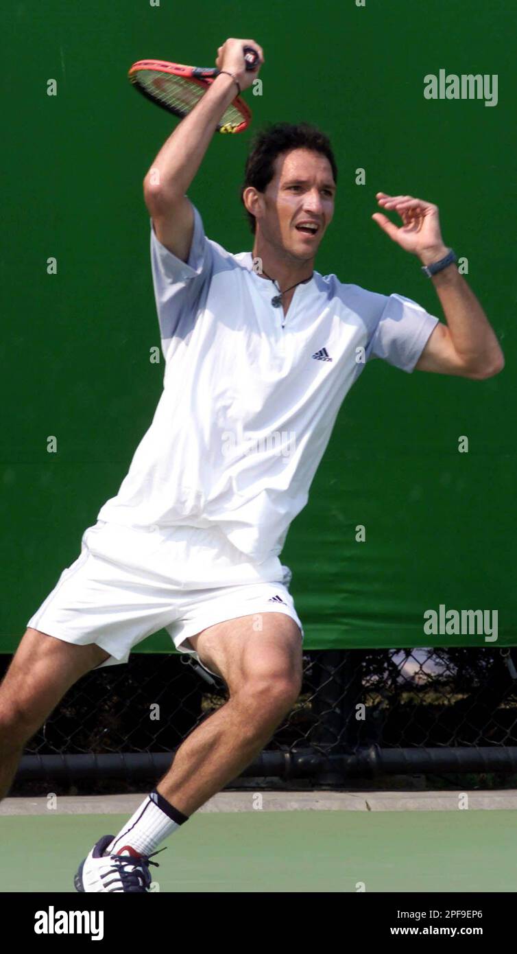 David Sanchez from Spain plays in first set action against Kristian Pless  from Denmark at the Australian Open tennis championship in Melbourne,  Monday, Jan. 13, 2003. (AP Photo/Russell McPhedran Stock Photo - Alamy