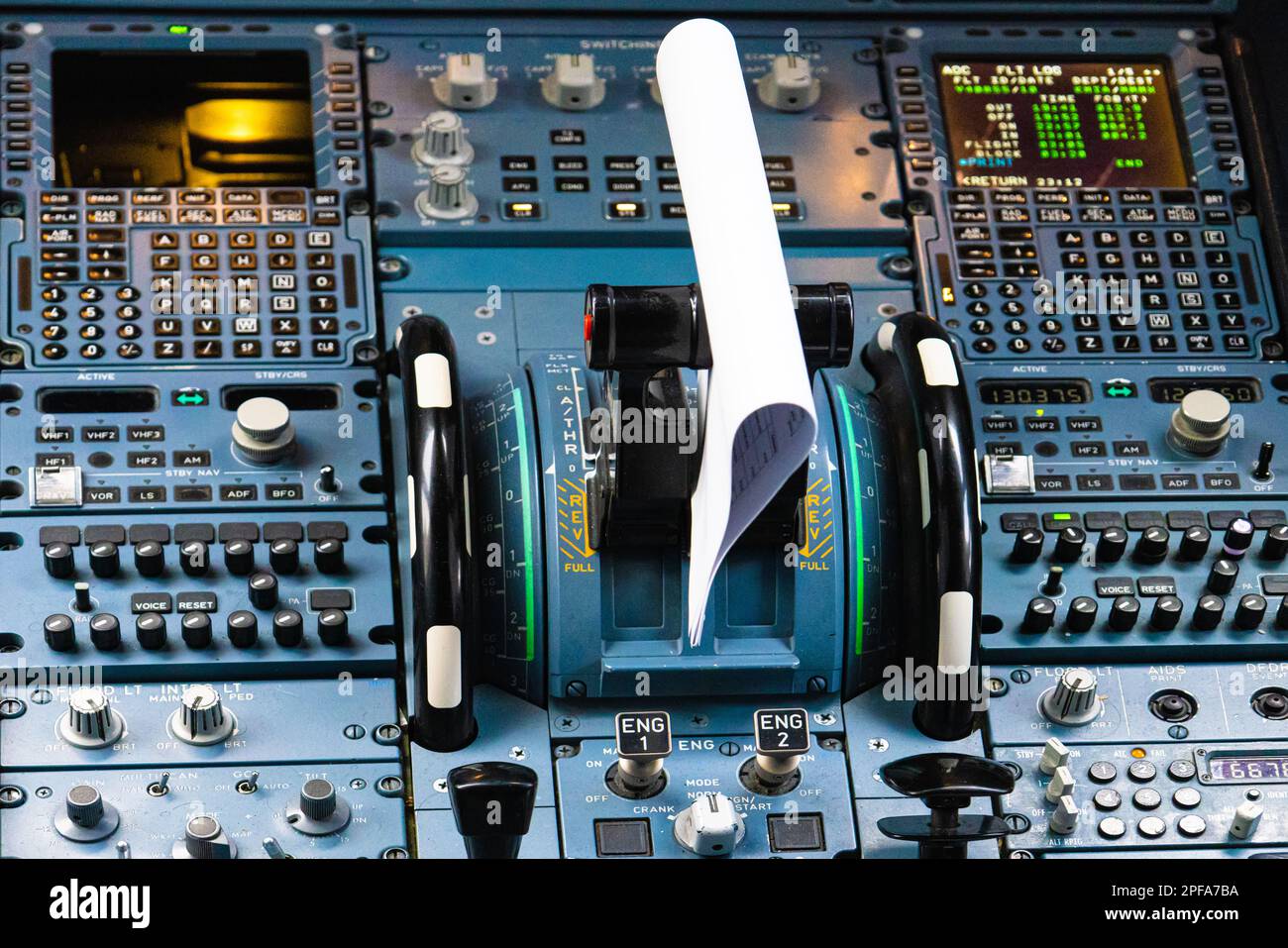 Flight control panel and flight management system in civil airplane cockpit. Stock Photo