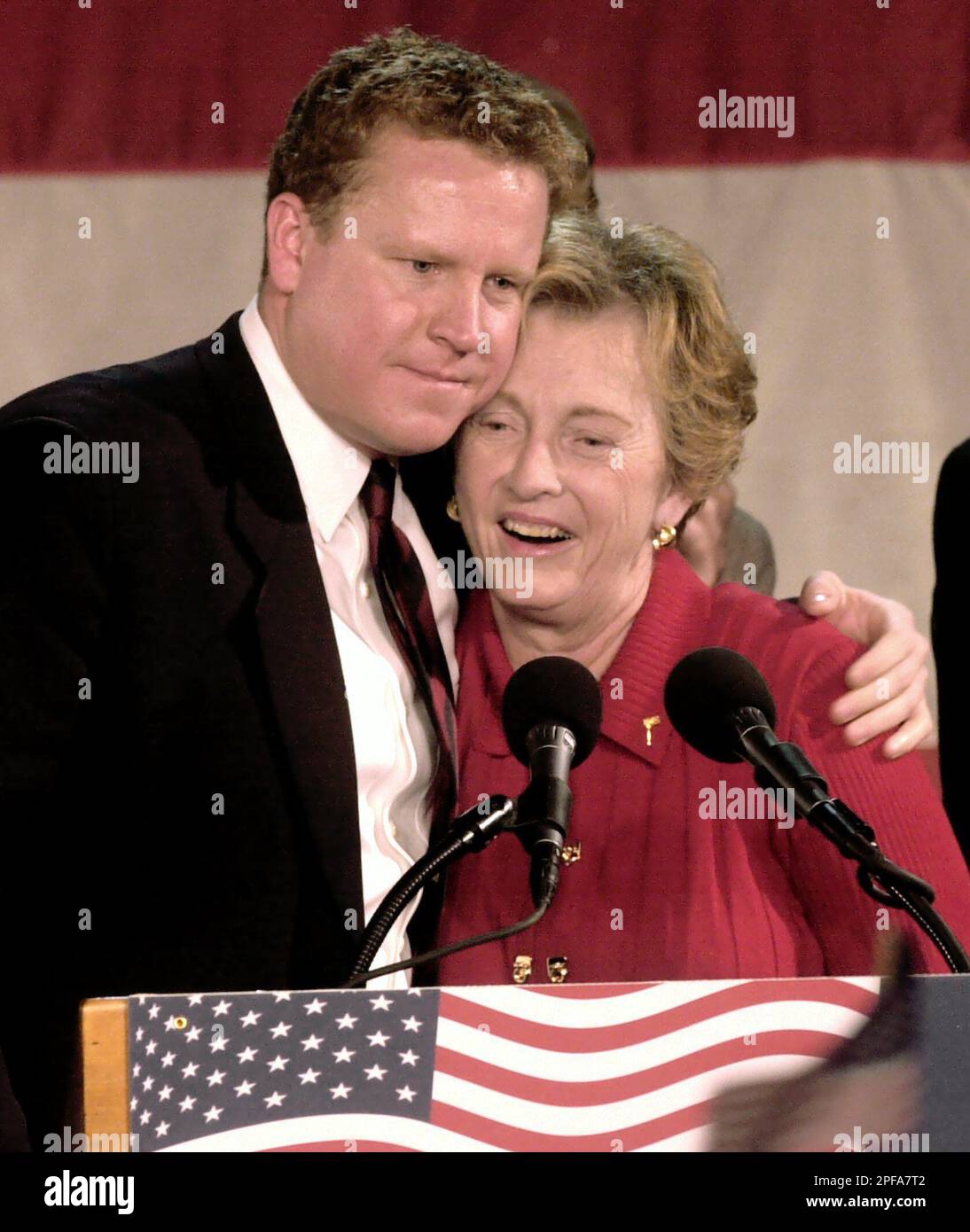 Sen. Jean Carnahan, DMo., is hugged by her son, Tom Carnahan
