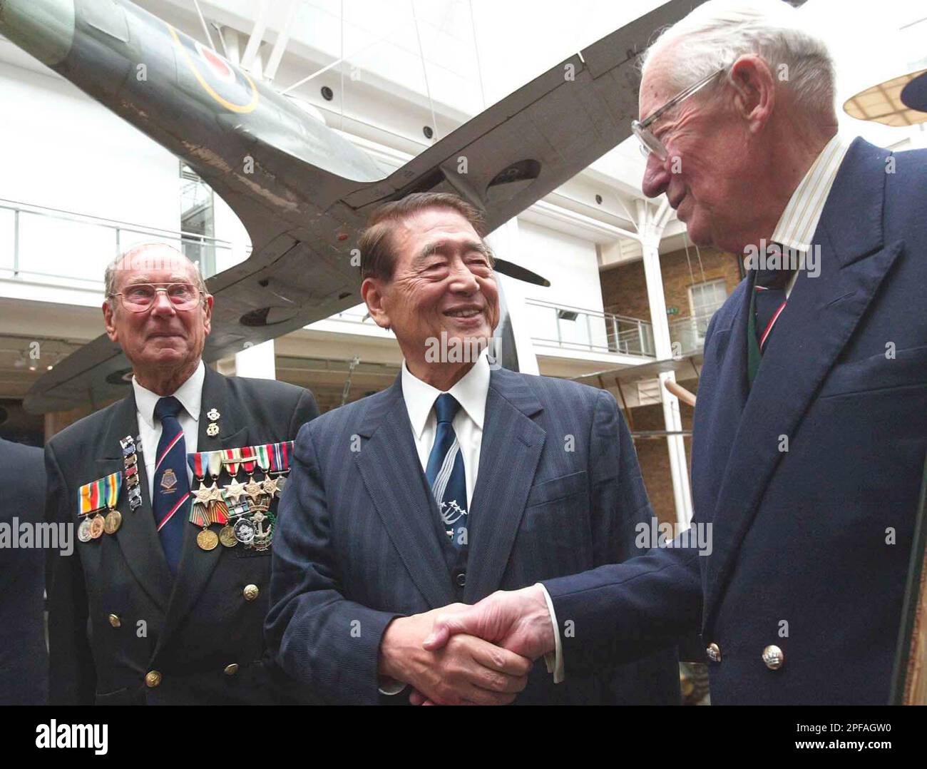 Japanese pilot Hichiro Naemura, centre, one of the few surviving