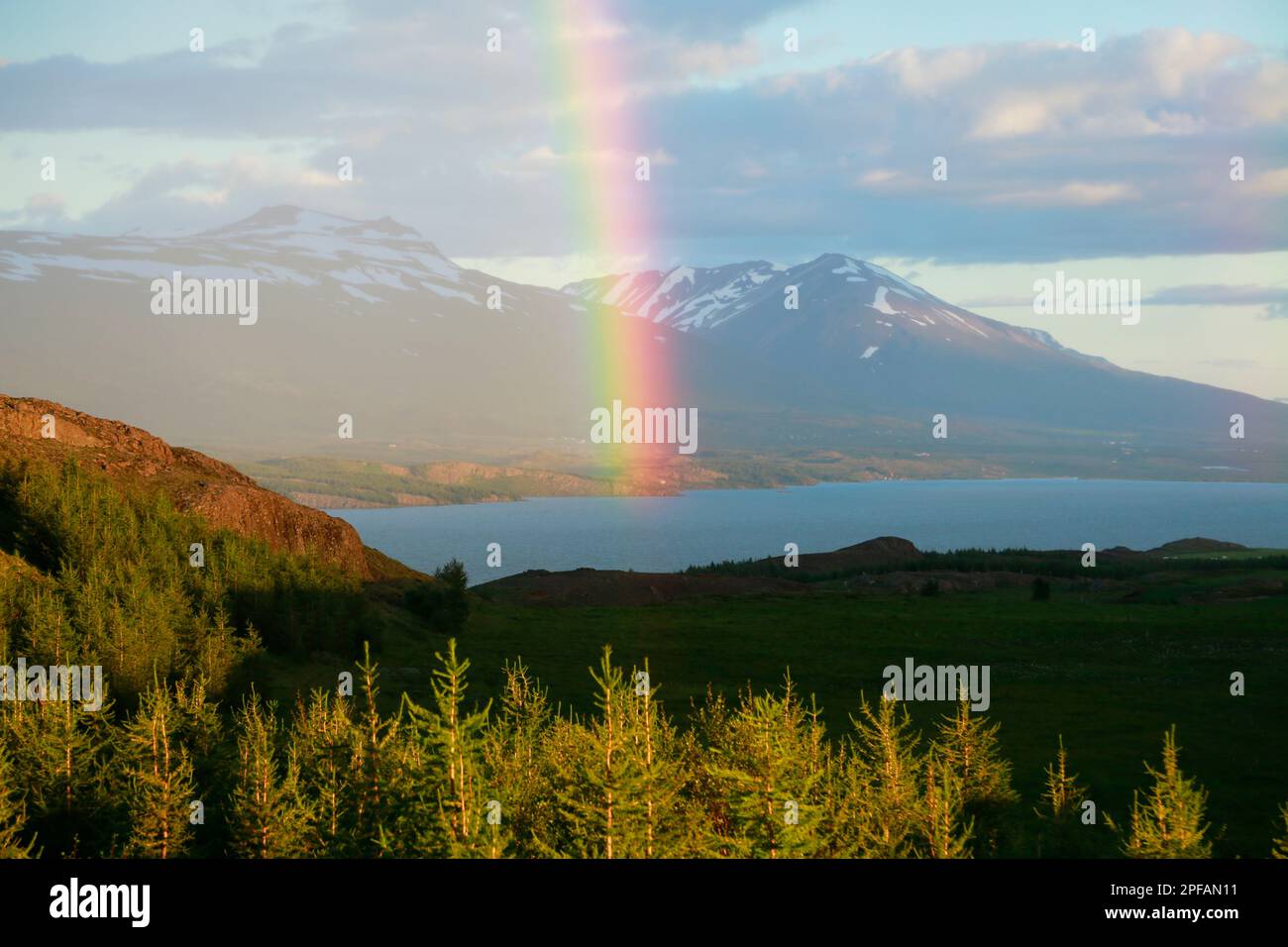 Rainbow over mountains. Egilisstaoir. Iceland Stock Photo