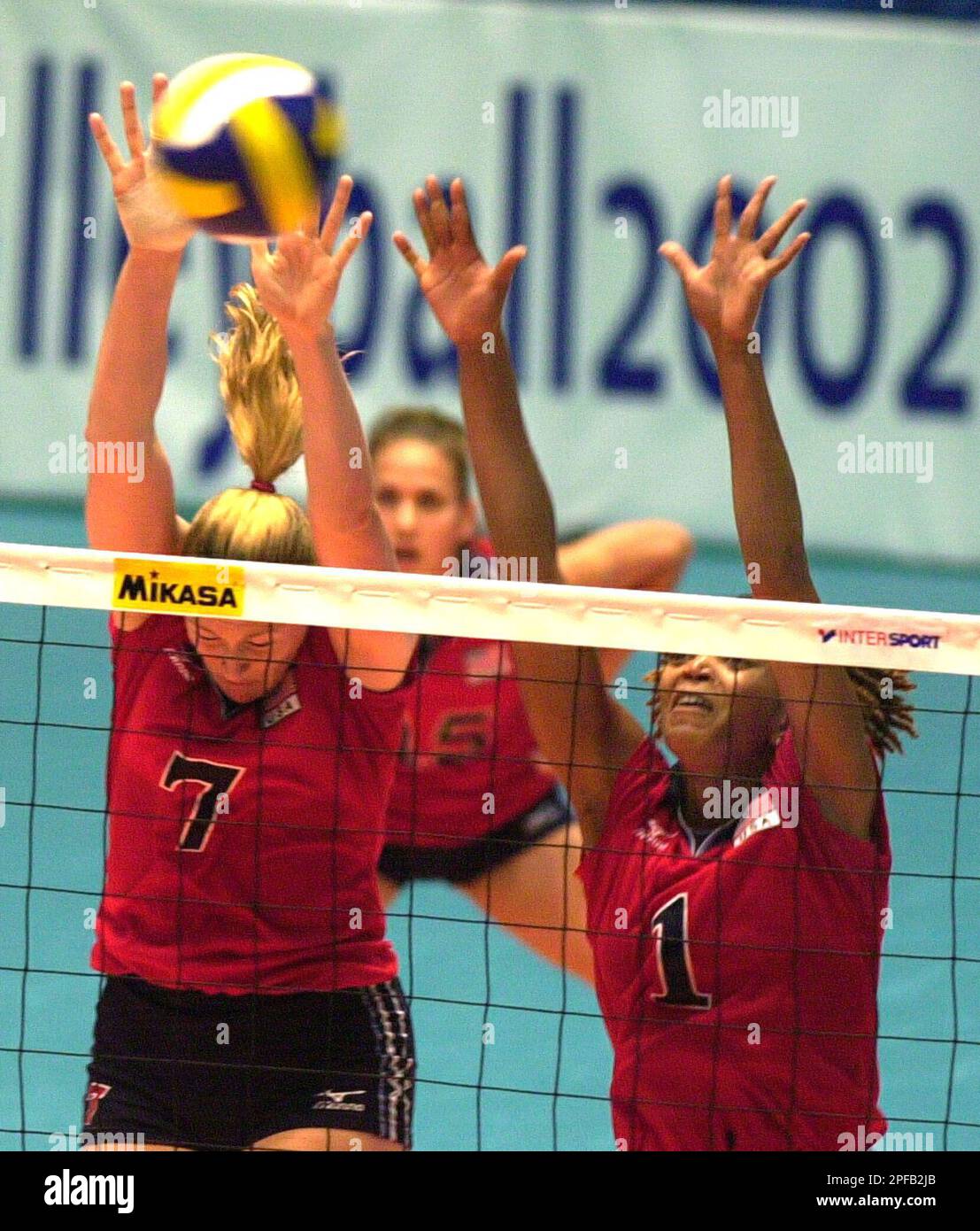 Heather Bown, 7, and Prikeba Phipps, 1, of the USA block a Russian attack  successful during the Women`s Volleyball World Championship first round  match between the USA and Russia in Riesa, eastern