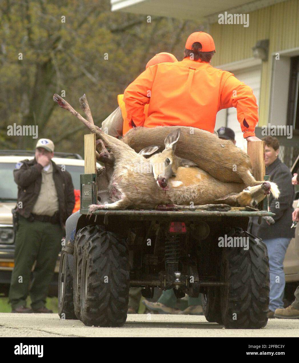 Deer hunters arrive at the Blue Mounds State Park, Wis. parks garage